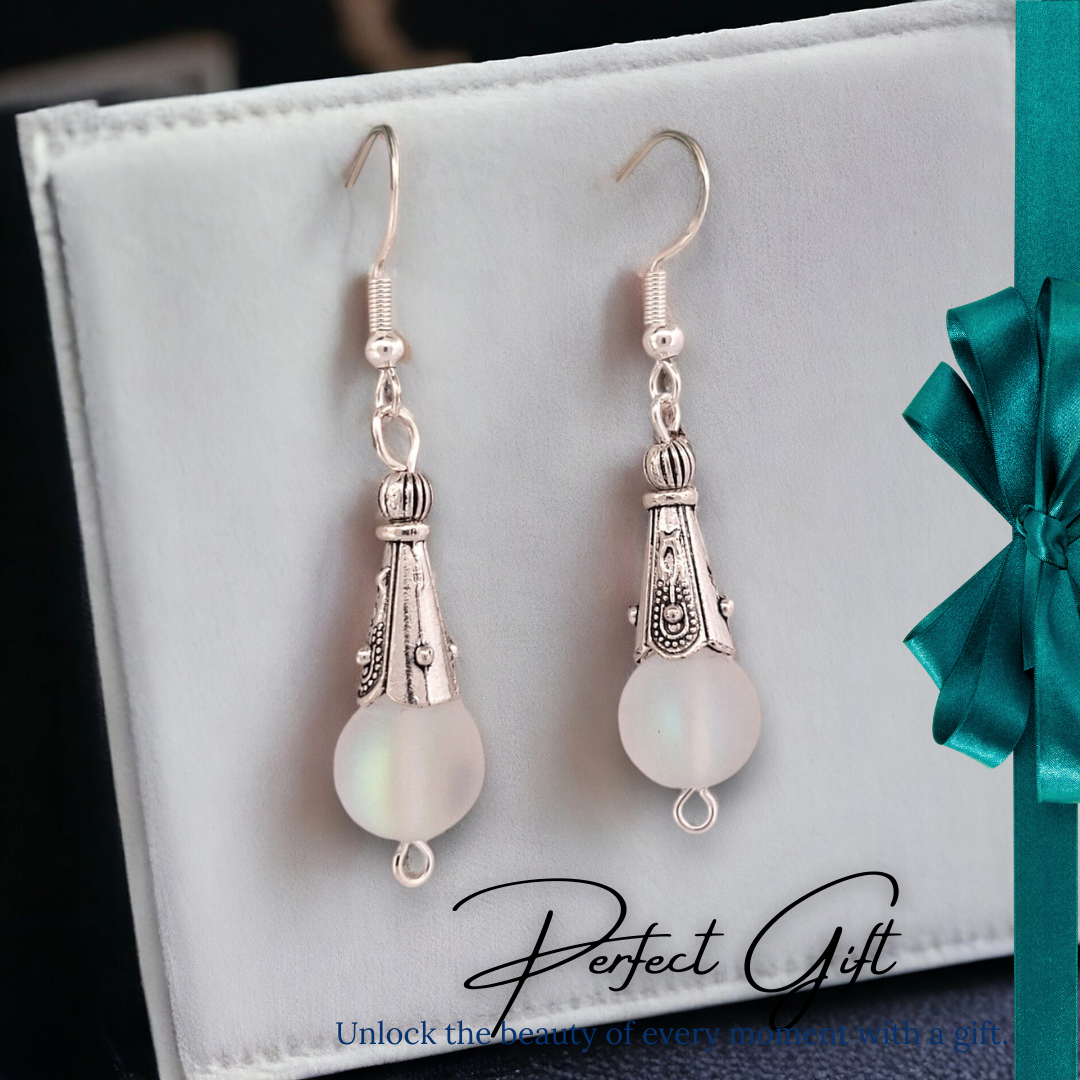 BeSheek Sterling Silver Clear Mermaid Glass and Tibetan Cone Dangle Fish Hook Earrings