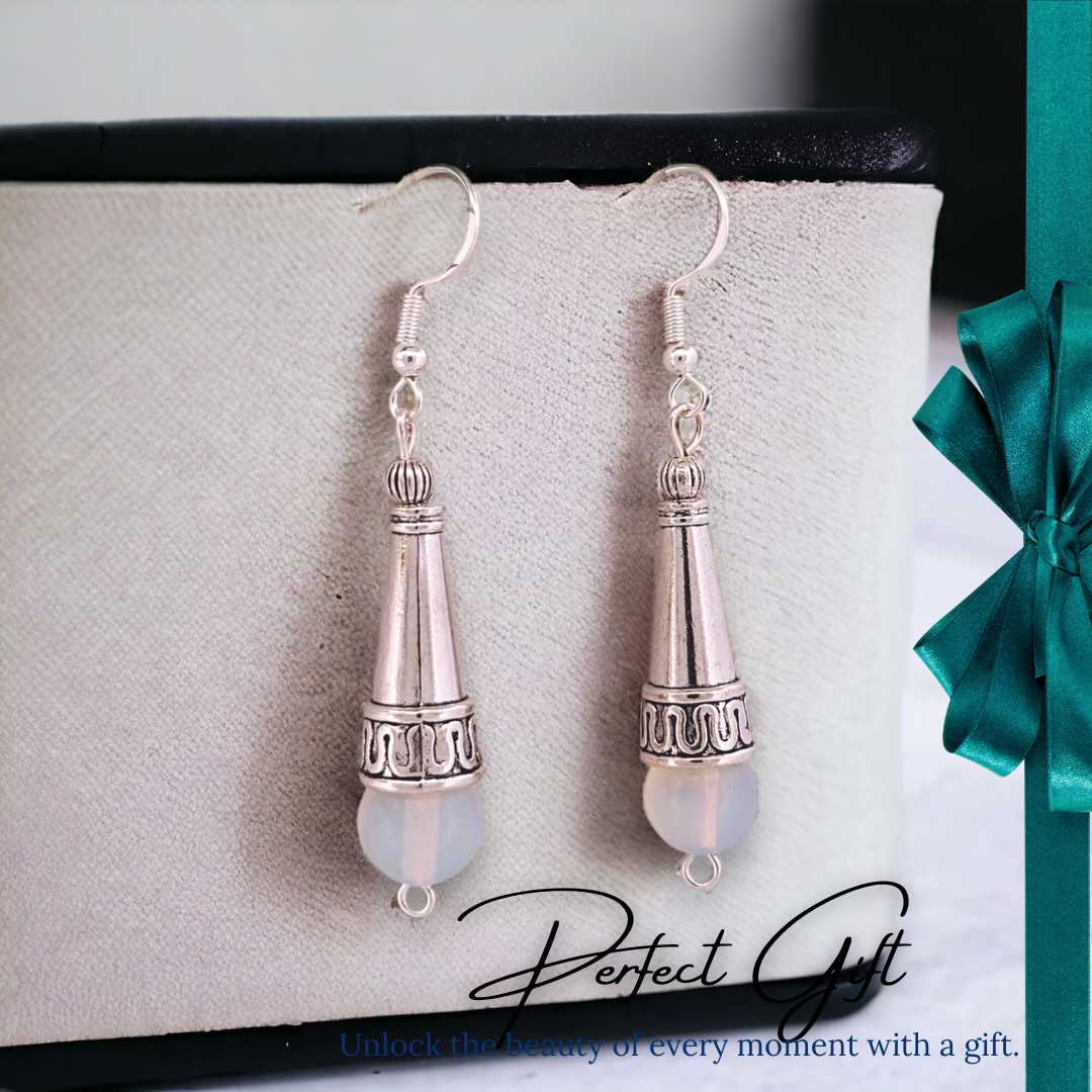 BeSheek Sterling Silver Tibetan Filigree Cone and Moonstone Dangle Earrings