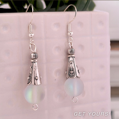 BeSheek Sterling Silver Clear Mermaid Glass and Tibetan Cone Dangle Fish Hook Earrings
